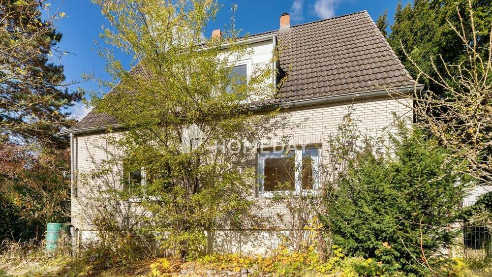 Geräumiges EFH mit 5 Zimmern, Keller, Garagen, Garten und viel Potenzial in ruhiger Lage 5 zimmer