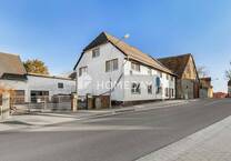 Vielseitiges Zweifamilienhaus mit großzügigem Grundstück und massivem Nebengebäude