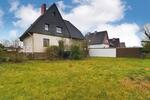 Ein-Zweifamilienhaus mit Tiefgarage & Carport