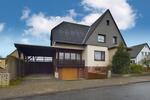 Ein-Zweifamilienhaus mit Tiefgarage & Carport