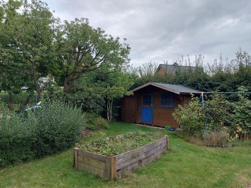 4 Zimmer Eigentumswohnung mit eigenem großen Garten